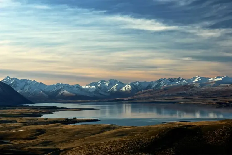 photography on a lake with moutains in the background